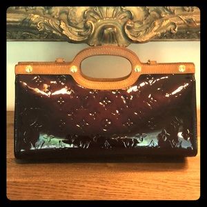 Authentic Louis Vuitton Roxbury Drive in Amarante